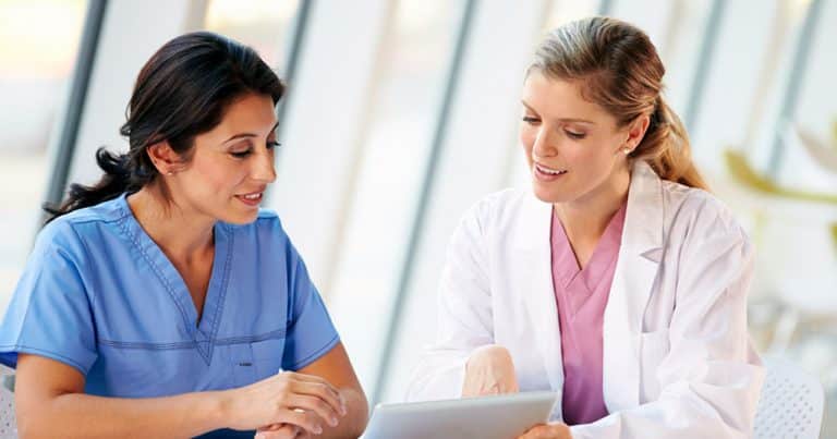 Hospital administrator with nurse